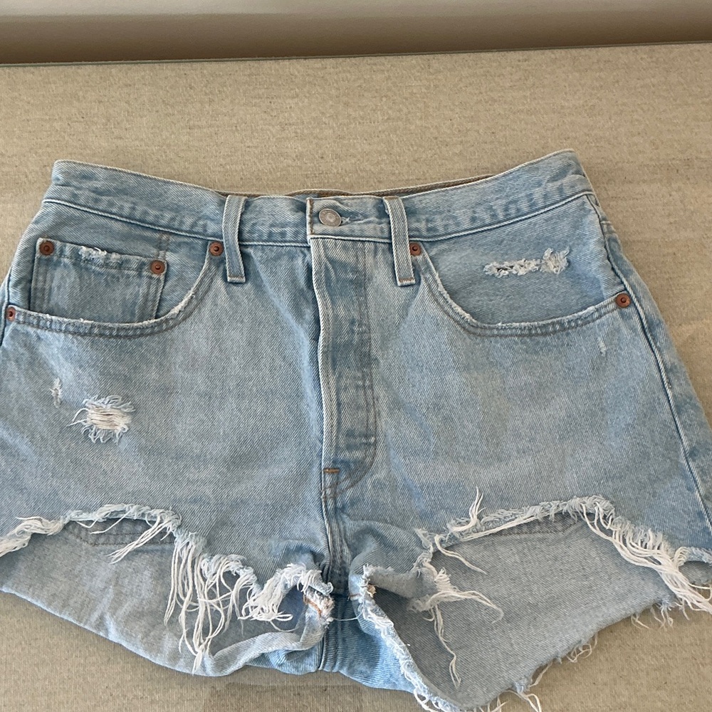 Distressed Light Blue Levi’s 501 Cut-Off Denim Shorts